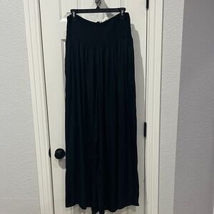 Elegant Black Super Wide Leg Boho style pants with pockets.